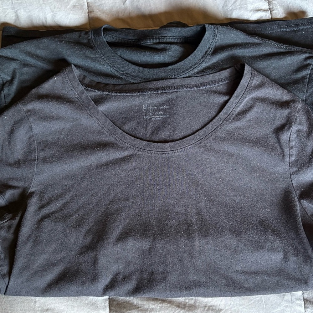 Two woman’s casual black t-shirts size S/M